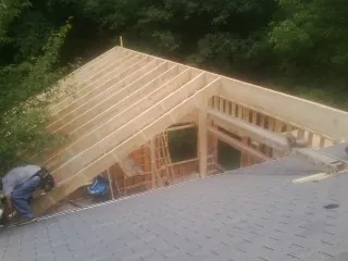 Framing a new roof addition that ties into an existing shingle roof in Morrison